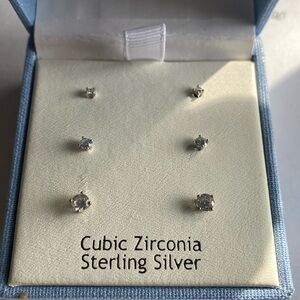 A set of three sterling silver cubic zirconia
